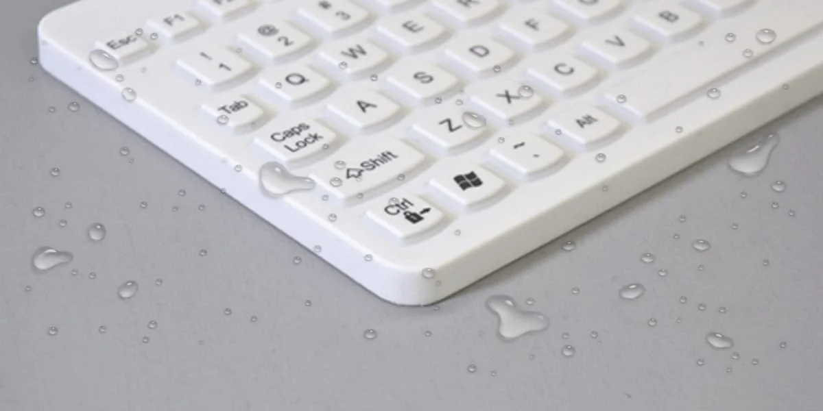 White washable keyboard resting flat on a worksurface